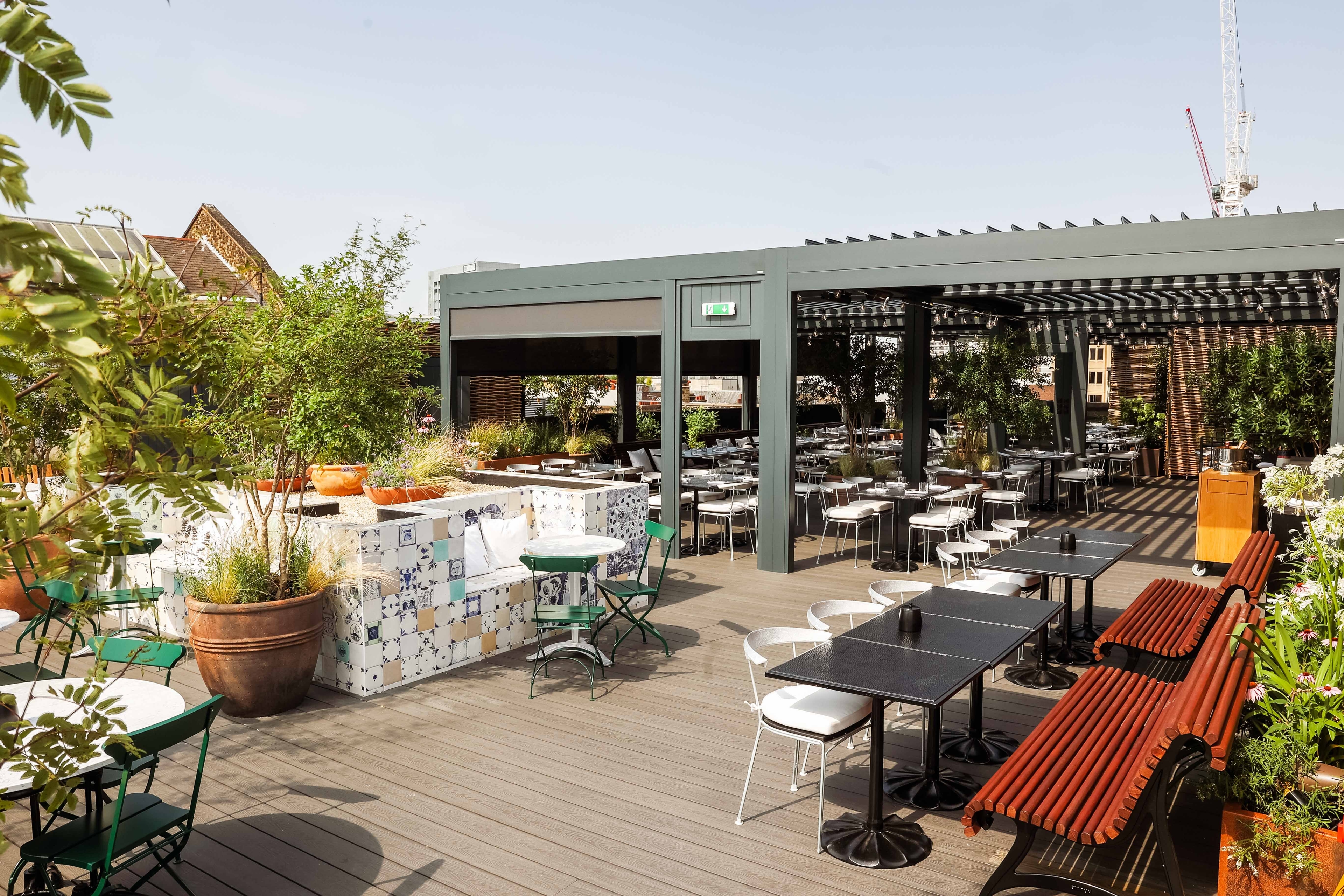 Photo of The Conduit, Rucola Restaurant & Rooftop Pergola