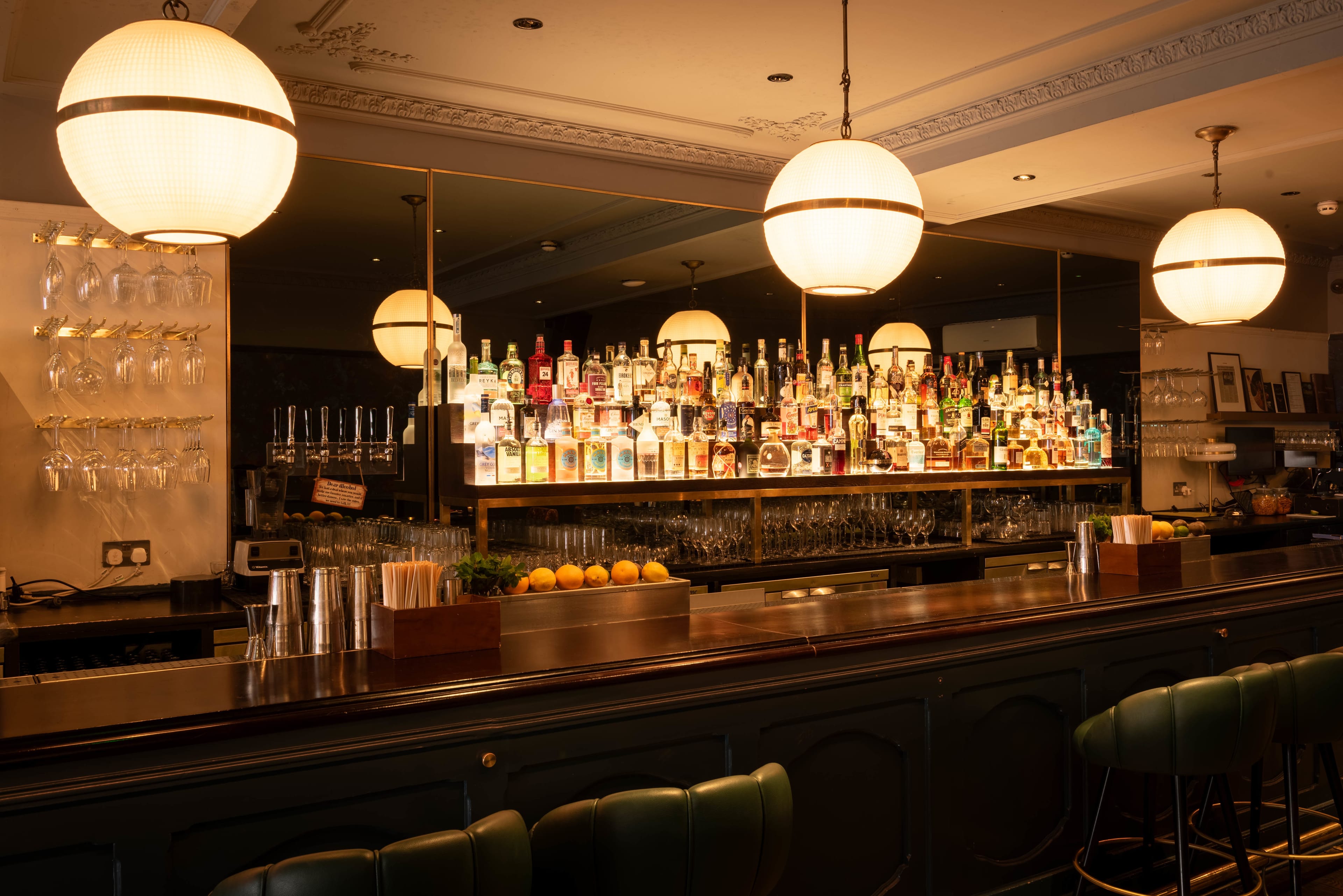 Photo of LOCKES Bar Covent Garden, Green Sofa Area