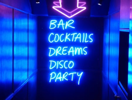 Manchester hidden venues neon bar sign